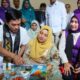 Pemandangan acara edukasi dan diskusi komunitas di Aceh dengan peserta dan pengunjung yang antusias.